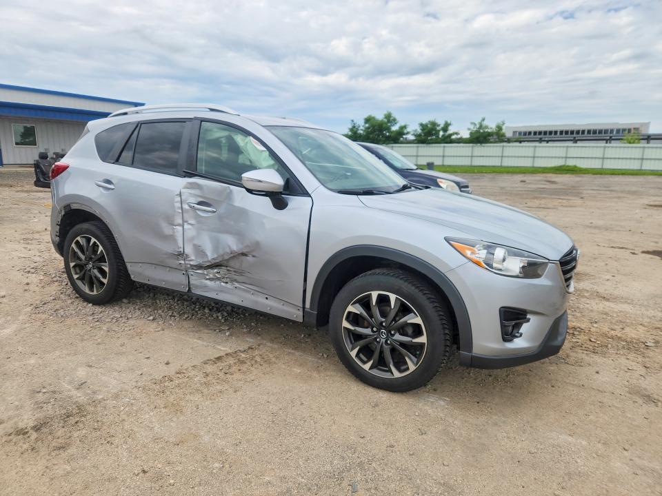 2016 Mazda Cx-5 VIN JM3KE4DY0G0839729 COPART salvage auction — SIDE, WI - CERTIFICATE OF TITLE, sold $3,800 on 2026-07-14 (photo 4)