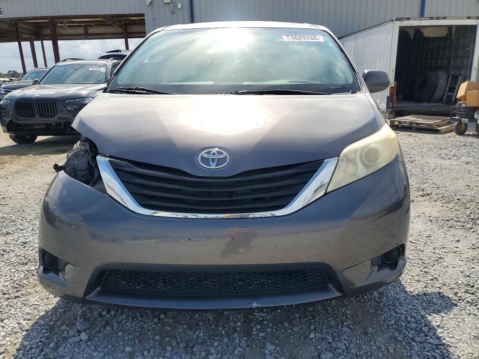 2014 Toyota Sienna VIN 5TDKK3DC7ES485511 COPART salvage auction — SIDE, FL - CERT OF TITLE SLVG REBUILDABLE, sold $1,450 on 2026-07-10 (photo 5)