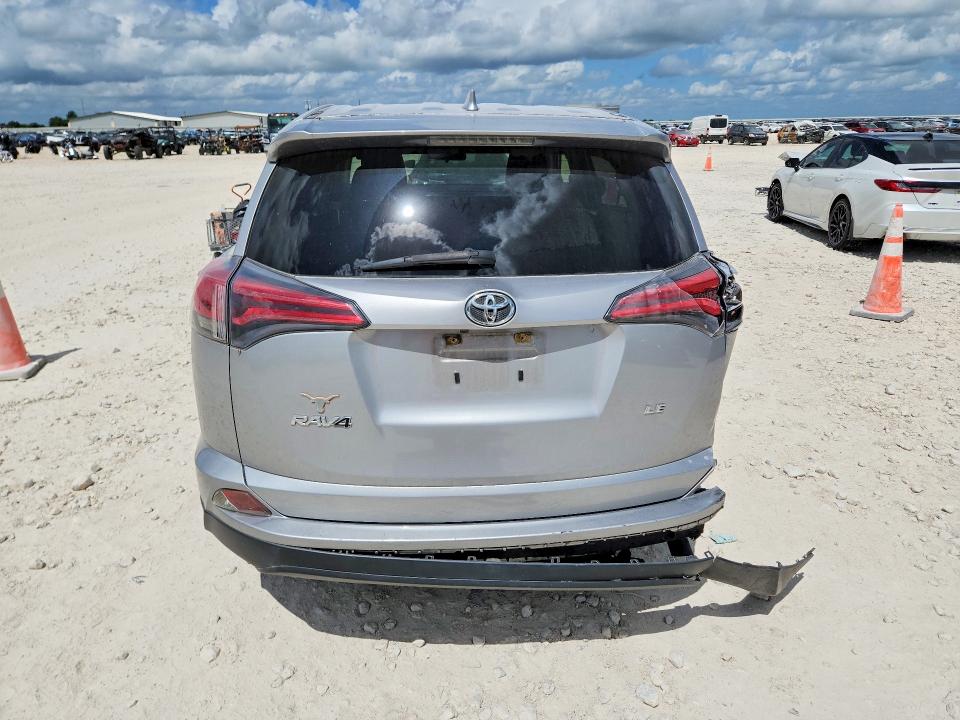 2018 Toyota Rav 4 VIN JTMZFREV0JJ198217 COPART salvage auction — REAR END, Tx - Salvage Vehicle Title, sold $375 on 2026-07-30 (photo 6)