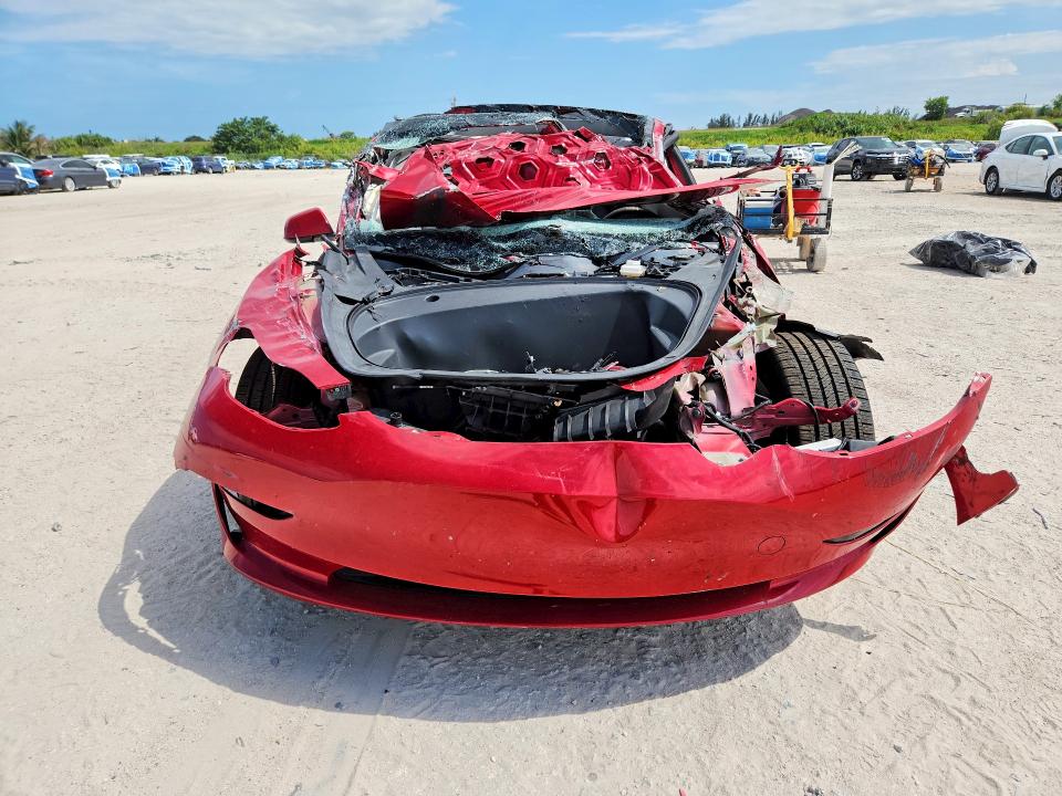 2023 Tesla Model 3 VIN 5YJ3E1EA9PF433754 COPART salvage auction — ROLLOVER, Fl - Certificate Of Destruction, sold $1,400 on 2026-07-13 (photo 5)