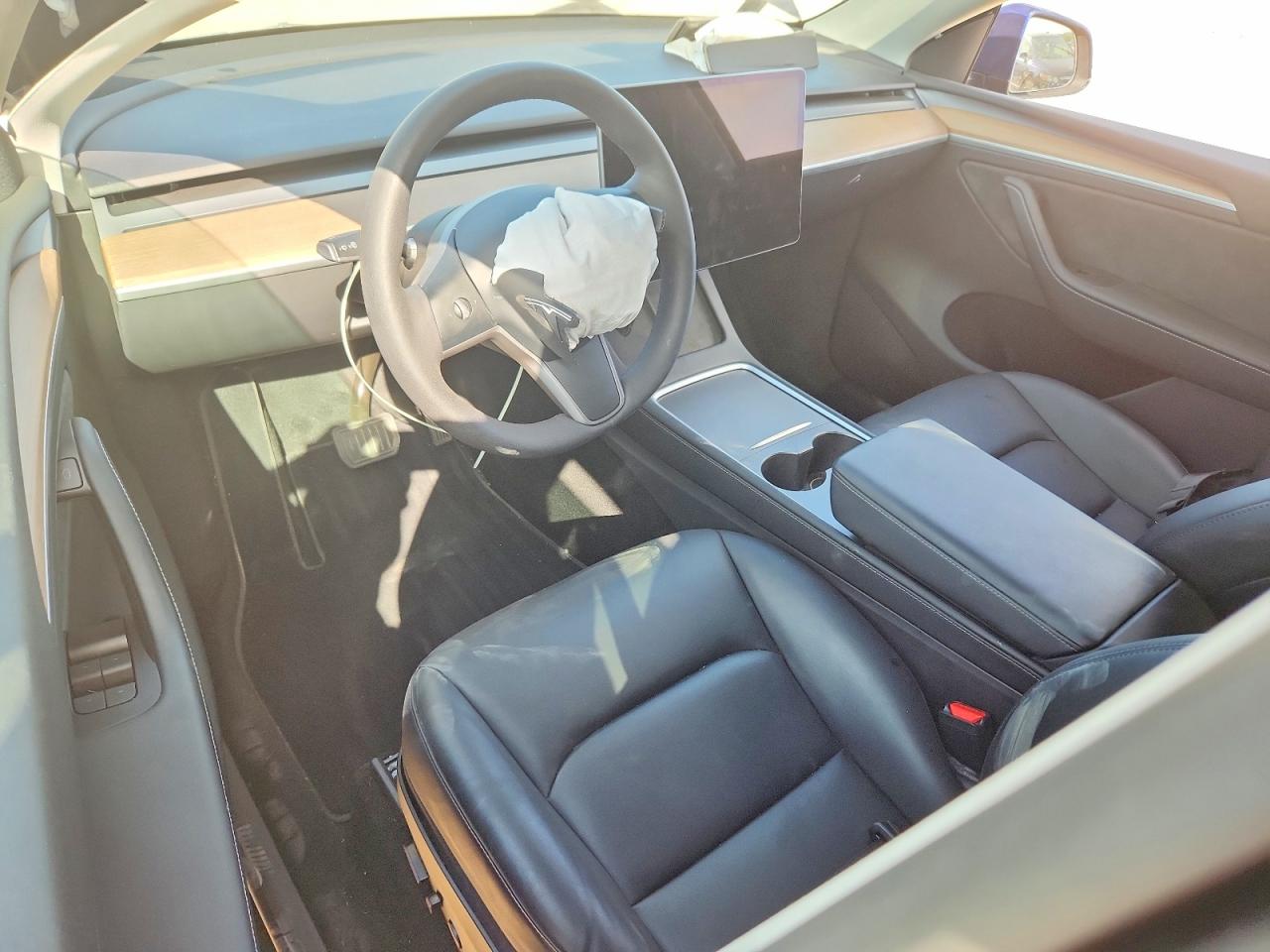 2023 Tesla Model Y VIN 7SAYGDEE6PA107897 COPART salvage auction — Front End, TX - SALVAGE VEHICLE TITLE, sold $9,000 on 2026-07-09 (photo 8)