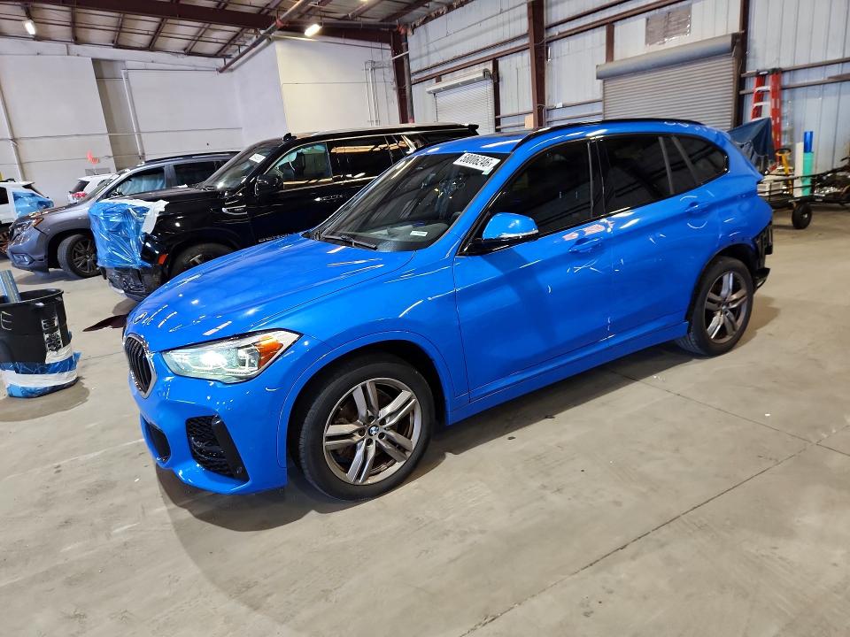 2021 BMW X1 VIN WBXJG7C06M5S33428 COPART salvage auction — REAR END, Fl - Cert Of Title Slvg Rebuildable, sold $8,900 on 2026-07-06 (photo 1)