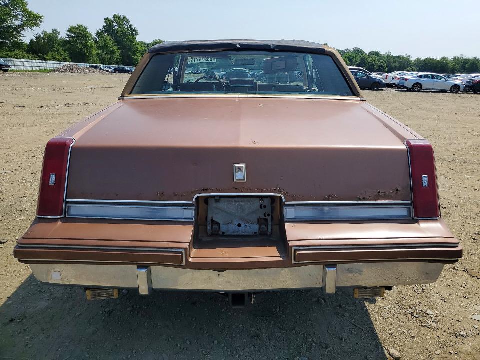 1986 Oldsmobile Cutlass supreme VIN 1G3GM47Y0GP378102 COPART salvage auction — NORMAL WEAR, Nj - Certificate Of Title, sold $4,250 on 2026-07-06 (photo 6)