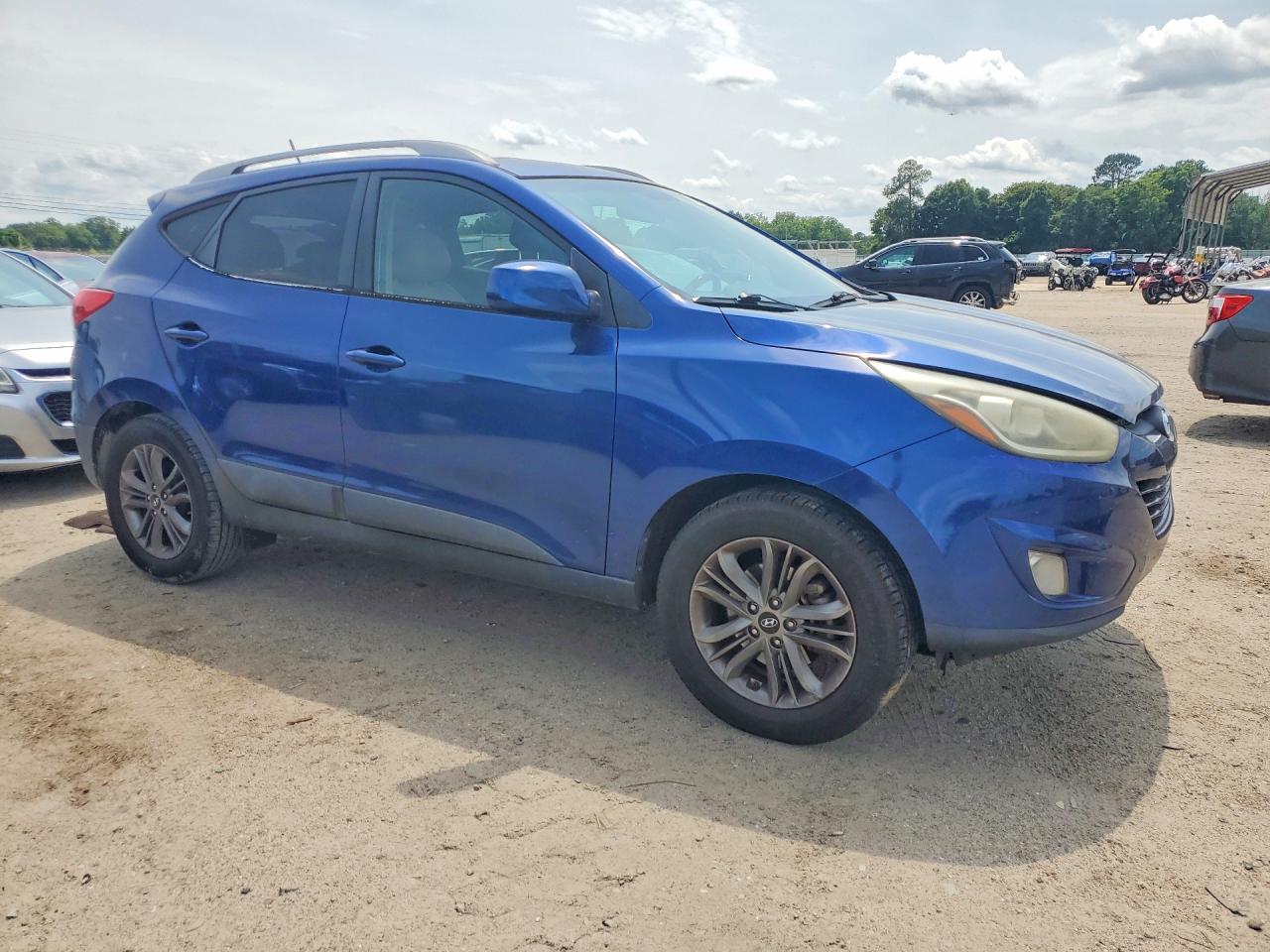 2014 Hyundai Tucson VIN KM8JU3AG2EU799930 COPART salvage auction — Side, AL - CERT OF TITLE-SALVAGE TITLE, sold $1,100 on 2026-07-02 (photo 4)