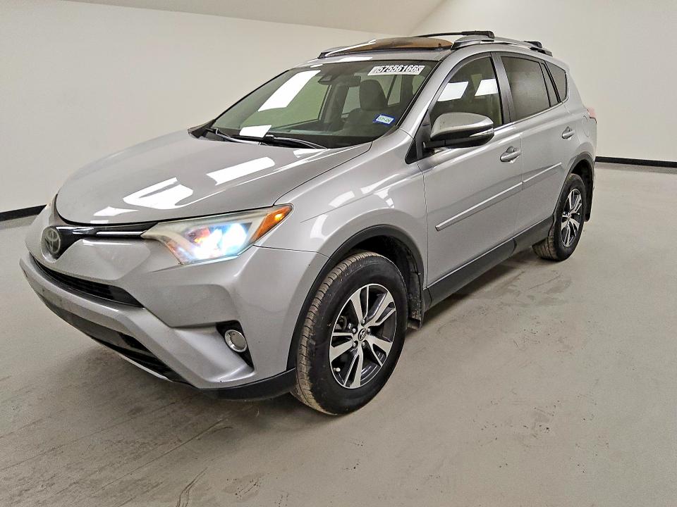 2018 Toyota Rav4 VIN JTMWFREV6JJ194806 COPART salvage auction — REAR END, TX - CERTIFICATE OF TITLE, sold $6,300 on 2026-07-14 (photo 1)