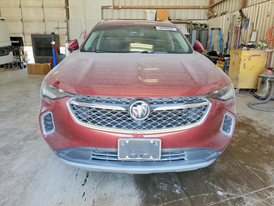 2021 Buick Envision VIN LRBFZSR4XMD053349 COPART salvage auction — WATER/FLOOD, Tx - Salvage Vehicle Title, sold $60 on 2026-07-24 (photo 5)