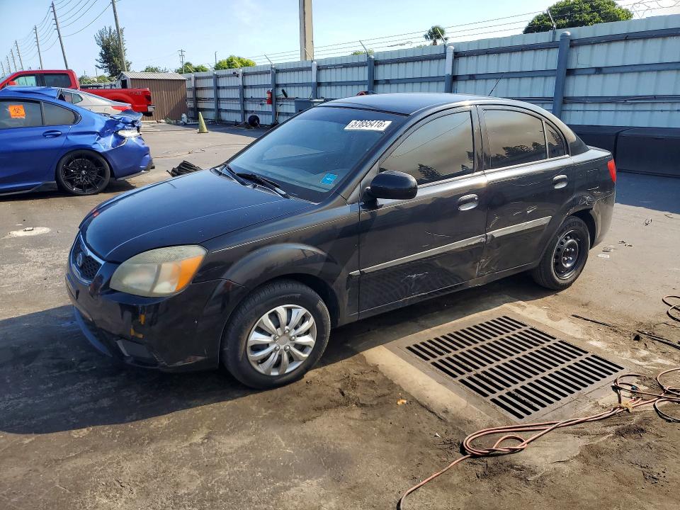 2010 Kia Rio VIN KNADH4A38A6635781 COPART salvage auction — SIDE, Fl - Cert Of Title Slvg Rebuildable, sold $425 on 2026-07-11 (photo 1)