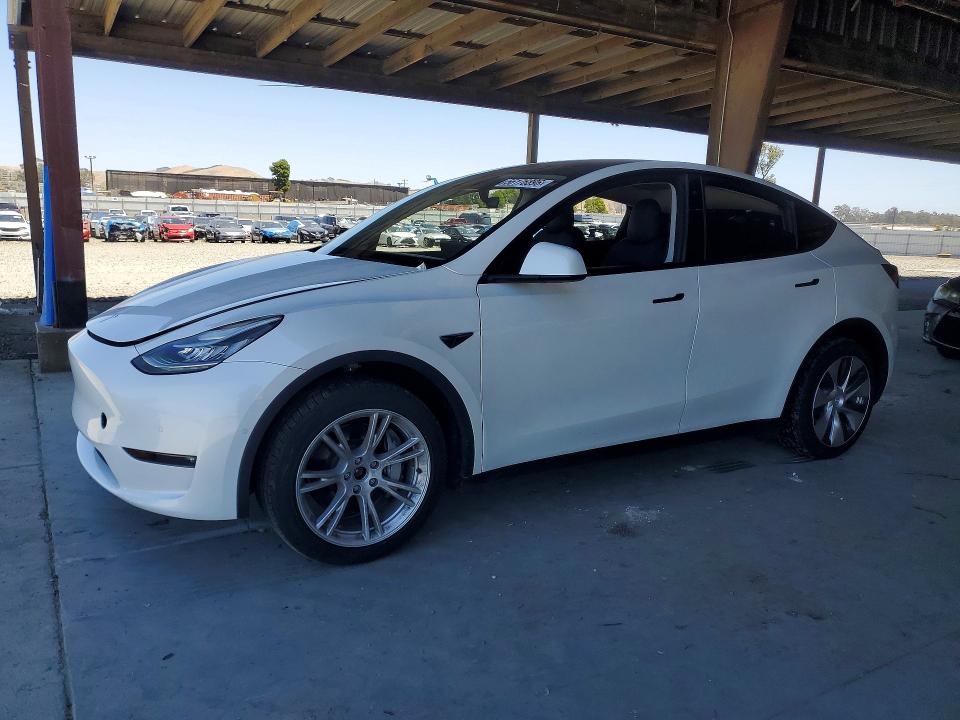 2022 Tesla Model y VIN 7SAYGDEE3NF354195 COPART salvage auction — REAR END, Salvage Title, sold $15,600 on 2026-07-13 (photo 1)