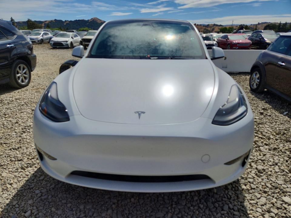2022 Tesla Model y VIN 7SAYGDEF9NF411282 COPART salvage auction — UNDERCARRIAGE, Salvage Title, sold $11,300 on 2026-07-16 (photo 5)