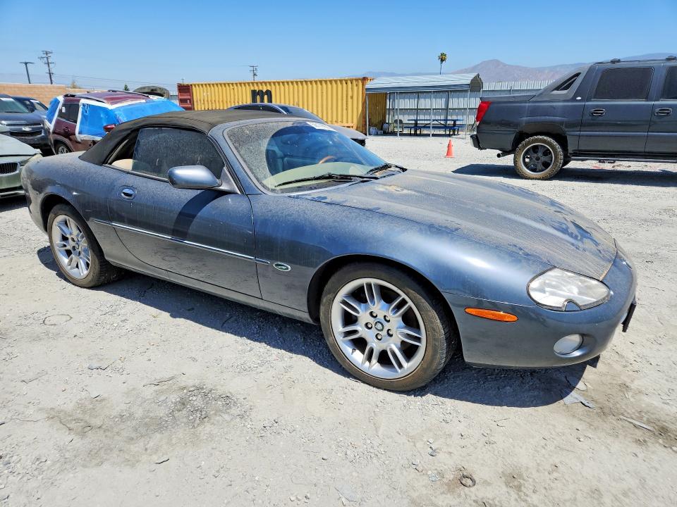 2001 Jaguar Xk series VIN SAJDA42C31NA11063 COPART salvage auction — MINOR DENT/SCRATCHES, Ca - Dis/Dlr/Exp Only Clean Title, sold $500 on 2026-07-15 (photo 4)