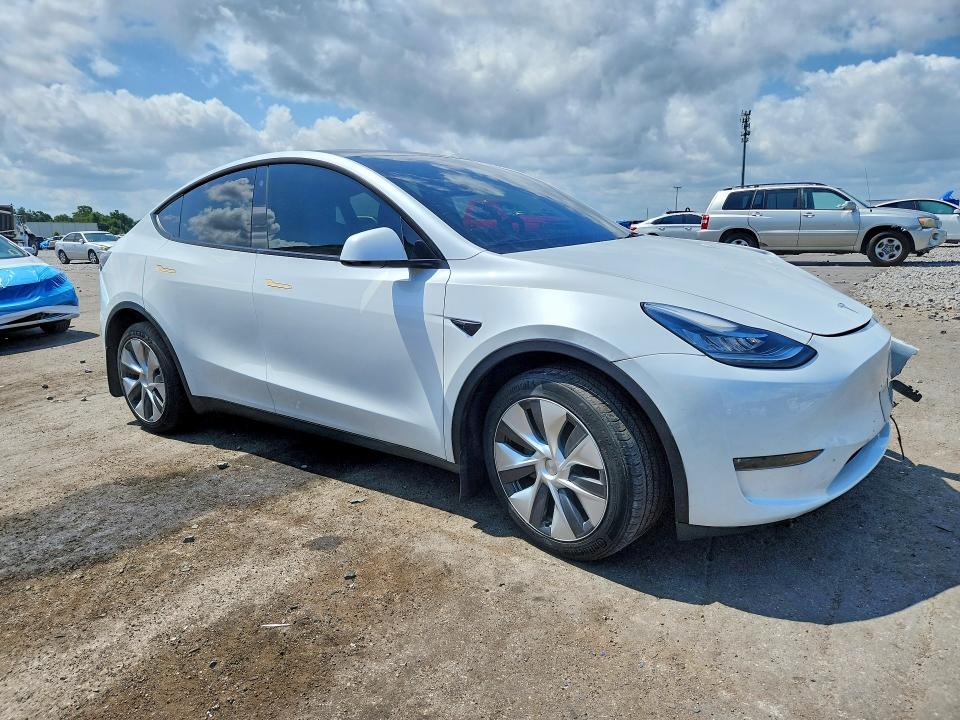 2023 Tesla Model y VIN 7SAYGDEE2PA079340 COPART salvage auction — FRONT END, Fl - Cert Of Title Slvg Rebuildable, sold $14,100 on 2026-07-13 (photo 4)