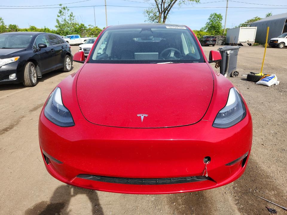 2023 Tesla Model y VIN LRWYGDFDXPC966569 COPART salvage auction — REAR END, Qc - Gravement Accidente, sold $7,600 on 2026-07-07 (photo 5)