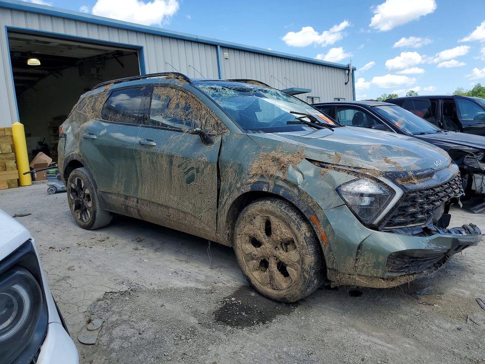 2023 Kia Sportage VIN 5XYK6CAF1PG059705 COPART salvage auction — ROLLOVER, Pa - Certificate Of Salvage, sold $7,100 on 2026-07-10 (photo 4)