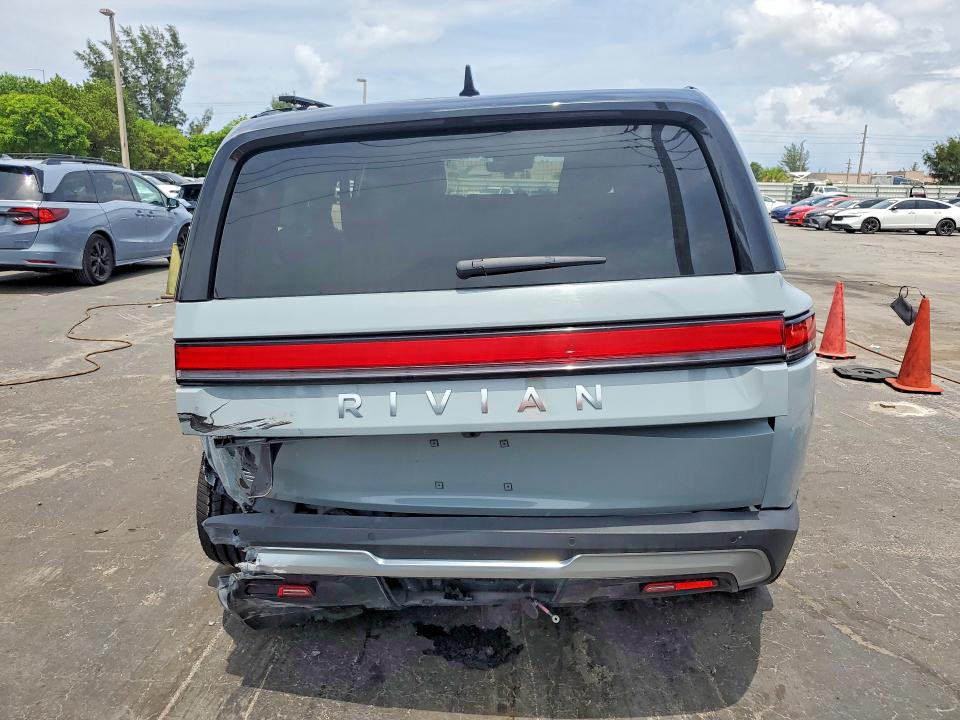 2025 Rivian R1s VIN 7PDSGBBA9SN054322 COPART salvage auction — SIDE, Ks - Cert Of Title-Salvage, sold $10,400 on 2026-07-20 (photo 6)