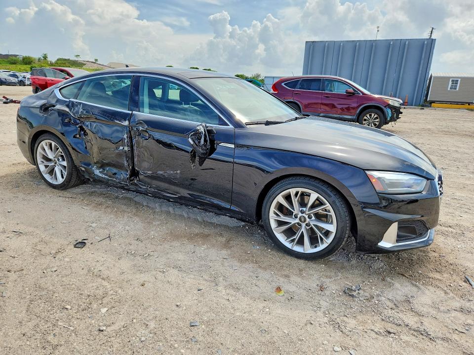 2022 Audi A5 VIN WAUABCF54NA032967 COPART salvage auction — SIDE, Fl - Cert Of Title Slvg Rebuildable, sold $8,500 on 2026-07-16 (photo 4)