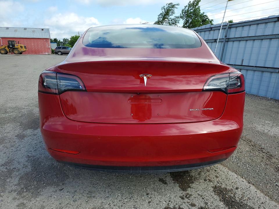 2018 Tesla Model 3 VIN 5YJ3E1EB1JF126997 COPART salvage auction — MINOR DENT/SCRATCHES, On - Permit Rebuilt - Unfit, sold $7,400 on 2026-07-03 (photo 6)