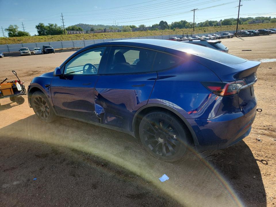 2022 Tesla Model y VIN 7SAYGDEE3NA011075 COPART salvage auction — ALL OVER, CO - SALVAGE TITLE, sold $6,600 on 2026-08-21 (photo 2)