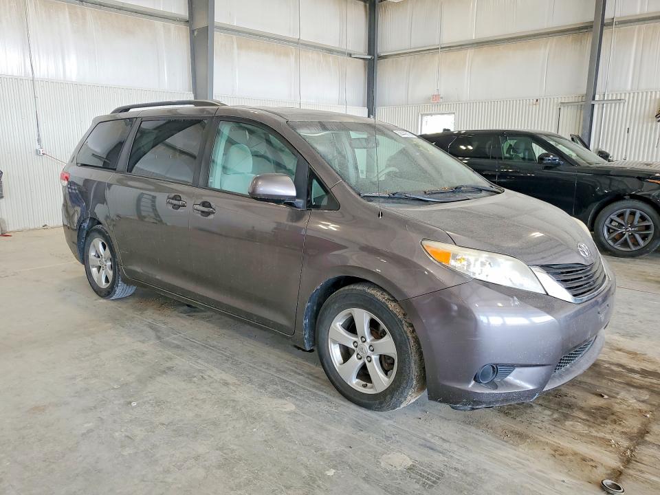 2011 Toyota Sienna VIN 5TDKK3DCXBS082053 COPART salvage auction — MINOR DENT/SCRATCHES, Ne - Certificate Of Title, sold $1,700 on 2026-07-02 (photo 4)