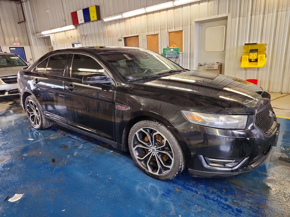 2014 Ford Taurus VIN 1FAHP2KT9EG109739 COPART salvage auction — MECHANICAL, Wv - Certificate Of Title (P), sold $4,500 on 2026-07-09 (photo 4)