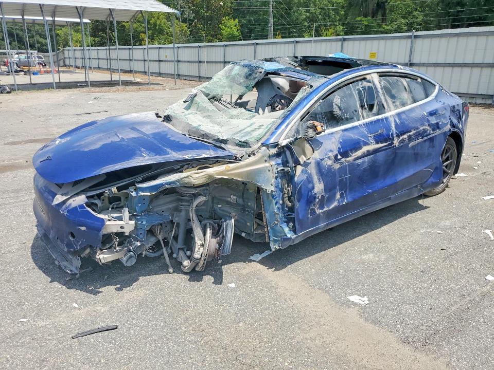 2019 Tesla Model 3 VIN 5YJ3E1EA2KF431739 COPART salvage auction — ALL OVER, FL - CERT OF TITLE-REBUILDABLE SLVG, sold $275 on 2026-07-02 (photo 1)