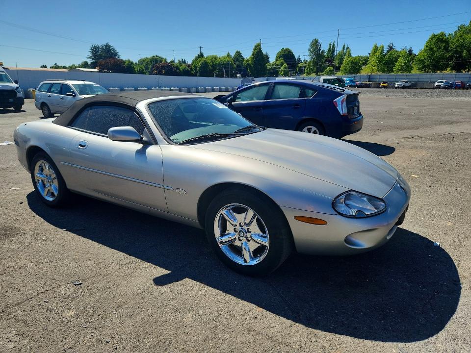 1999 Jaguar Xk series VIN SAJGX2049XC041200 COPART salvage auction — REAR END, Wa - Vehicle Cert Of Ownership-Titl, sold $1,750 on 2026-07-22 (photo 4)