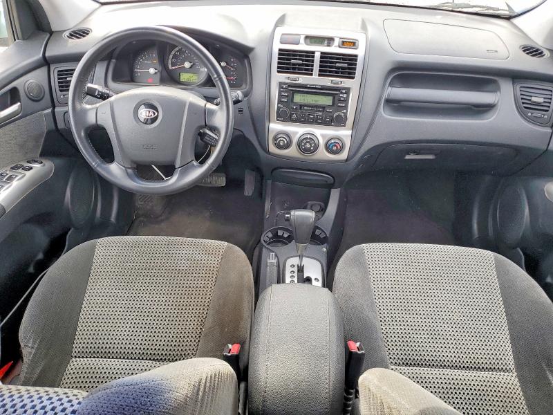 2006 Kia Sportage VIN KNDJE723767249482 COPART salvage auction — MECHANICAL, WA - VEHICLE CERT OF OWNERSHIP-TITL, sold $475 on 2026-07-24 (photo 8)