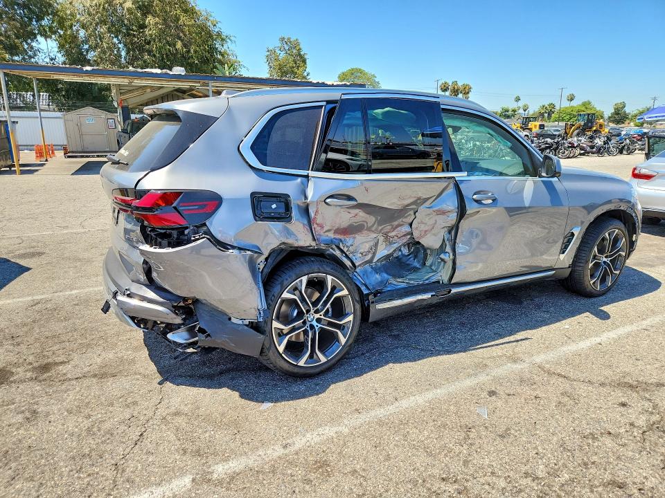 2026 BMW VIN 5UX13EU01T9319926 COPART salvage auction — SIDE, CA - SALVAGE CERTIFICATE, sold $23,100 on 2026-07-24 (photo 3)