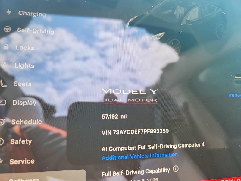 2023 Tesla Model y VIN 7SAYGDEF7PF892359 COPART salvage auction — HAIL, Mo - Salvage Certificate Of Title, sold $12,600 on 2026-07-29 (photo 9)