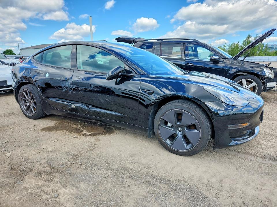 2021 Tesla Model 3 VIN 5YJ3E1EA2MF962443 COPART salvage auction — SIDE, On - Permit No Brand - Unfit, sold $9,400 on 2026-07-07 (photo 4)