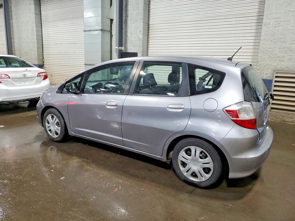 2009 Honda Fit VIN JHMGE88259S050655 COPART salvage auction — SIDE, Mn - Cert Of Title-Prior Salvage, sold $625 on 2026-07-07 (photo 2)
