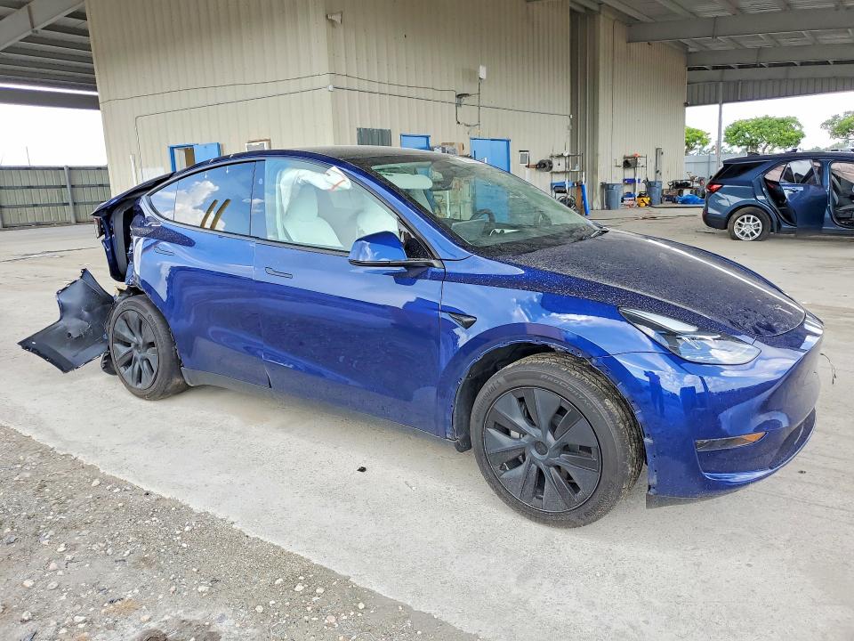 2025 Tesla Model y VIN 7SAYGDED8SF234606 COPART salvage auction — REAR END, Fl - Certificate Of Destruction, sold $9,100 on 2026-08-01 (photo 4)