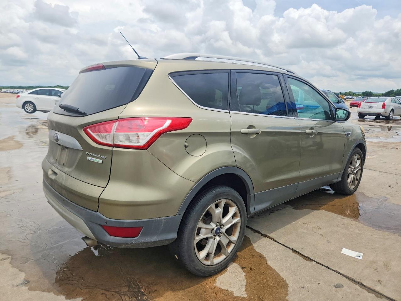 2014 Ford Escape VIN 1FMCU0JX1EUB34105 COPART salvage auction — Mechanical, TX - CERTIFICATE OF TITLE, sold $600 on 2026-07-02 (photo 3)