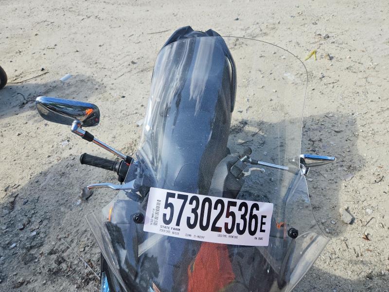 2014 Suzuki VIN JS1CK44B0E2100082 COPART salvage auction — MINOR DENT/SCRATCHES, FL - CERT OF TITLE SLVG REBUILDABLE, sold $50 on 2026-07-14 (photo 5)