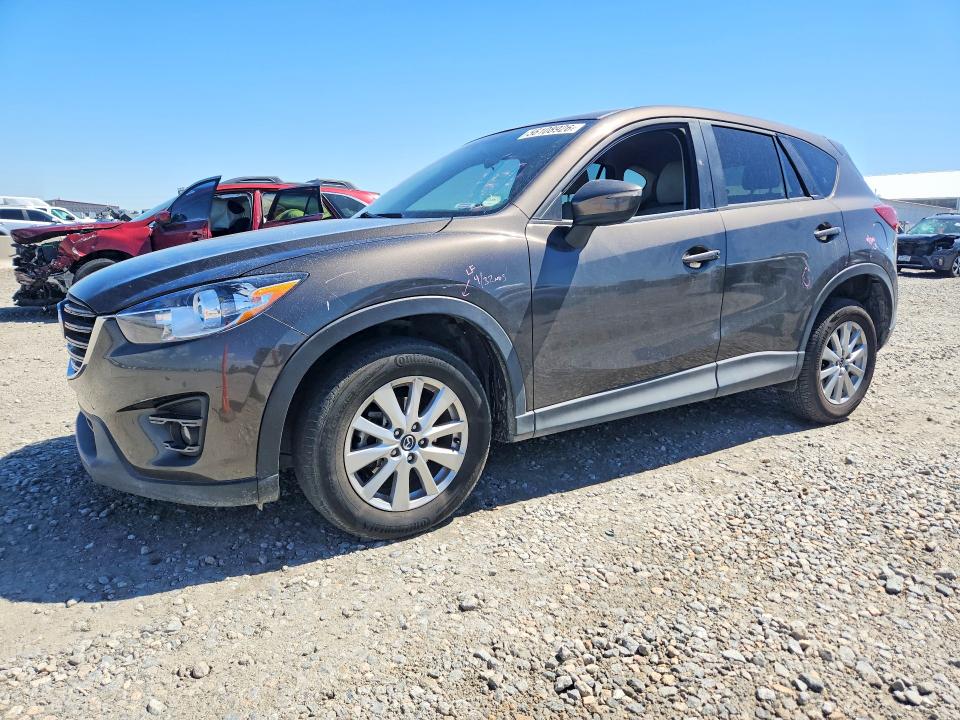 2016 Mazda Cx-5 VIN JM3KE4CY6G0855452 COPART salvage auction — SIDE, Co - Public - Salvage Title, sold $4,700 on 2026-07-07 (photo 1)