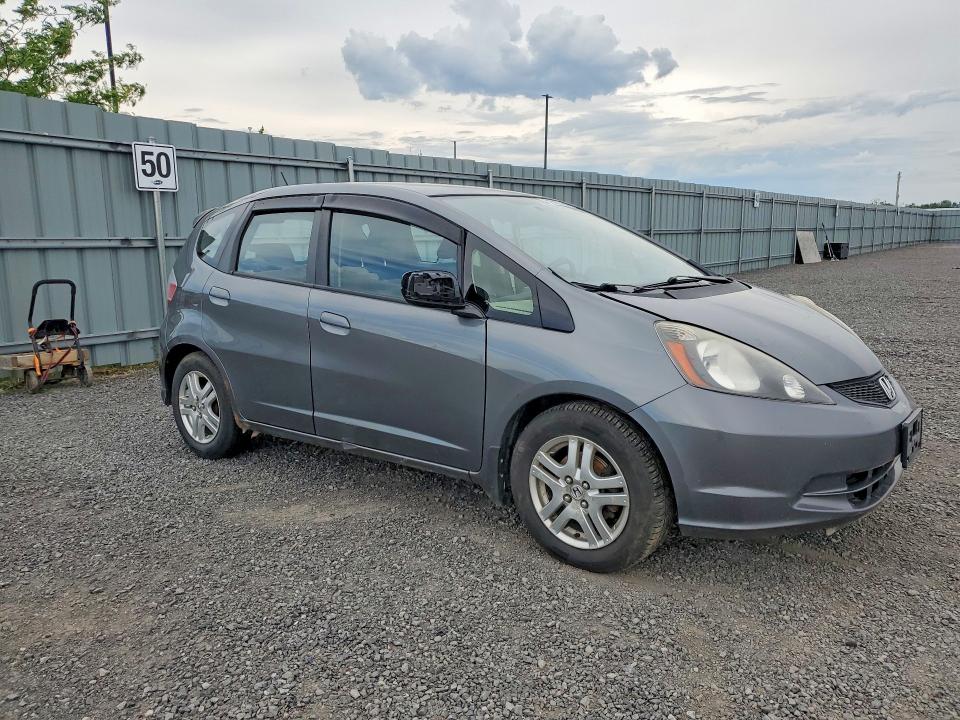 2013 Honda Fit VIN LUCGE8H54D3002459 COPART salvage auction — SIDE, ON - PERMIT SALVAGE, sold $150 on 2026-07-21 (photo 4)