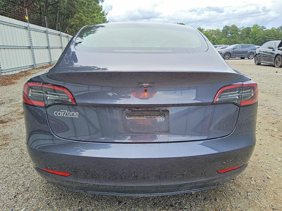 2023 Tesla Model 3 VIN 5YJ3E1EA5PF491330 COPART salvage auction — SIDE, GA - CERTIFICATE OF TITLE (P), sold $7,700 on 2026-07-16 (photo 6)