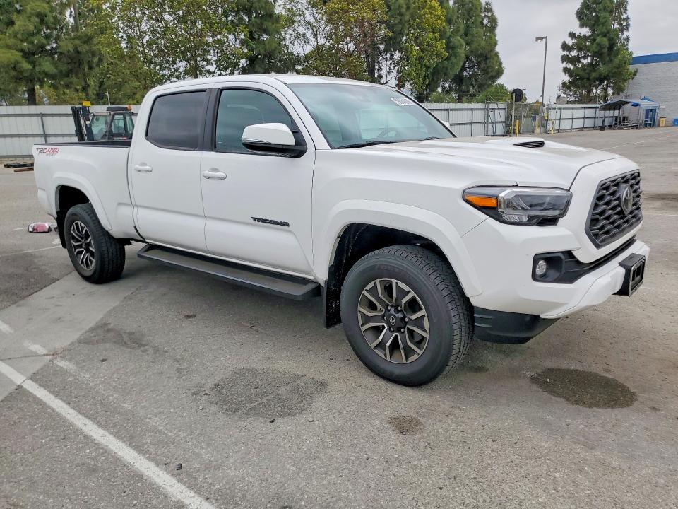 2023 Toyota Tacoma VIN 3TMDZ5BN5PM158547 COPART salvage auction — REAR END, Ca - Salvage Certificate, sold $15,200 on 2026-08-25 (photo 4)