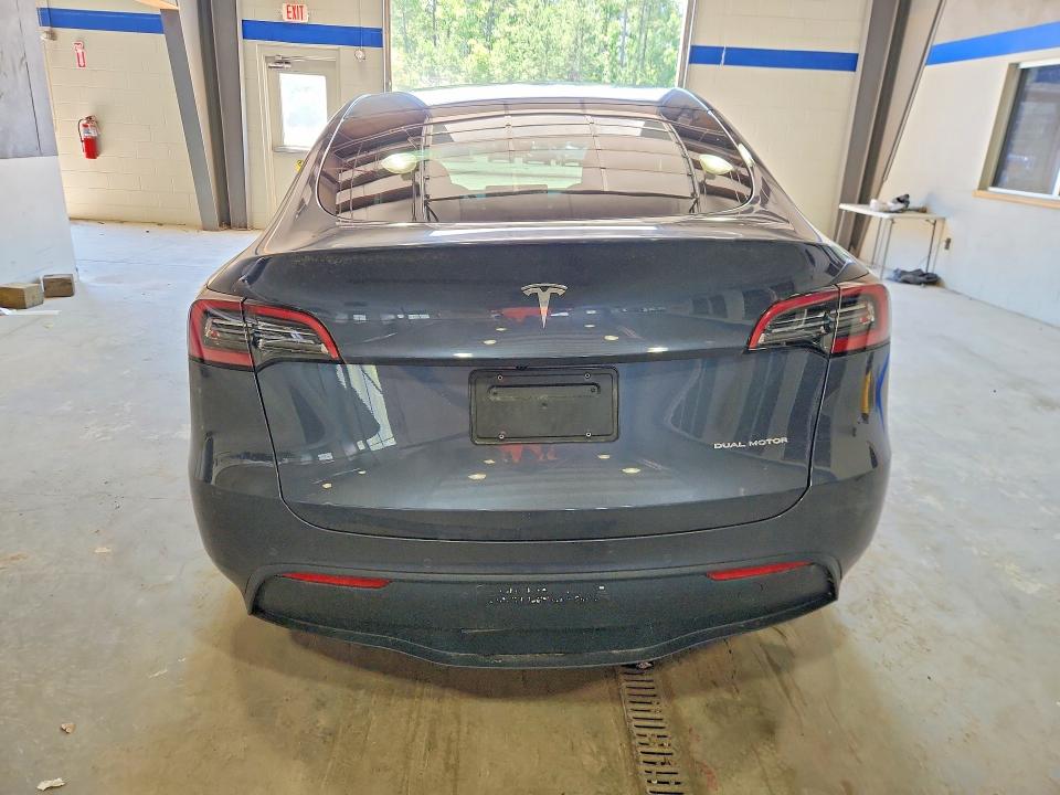 2022 Tesla Model y VIN 7SAYGDEE4NA020013 COPART salvage auction — UNDERCARRIAGE, Va - Cert Of Title - Salvage, sold $11,400 on 2026-07-17 (photo 6)