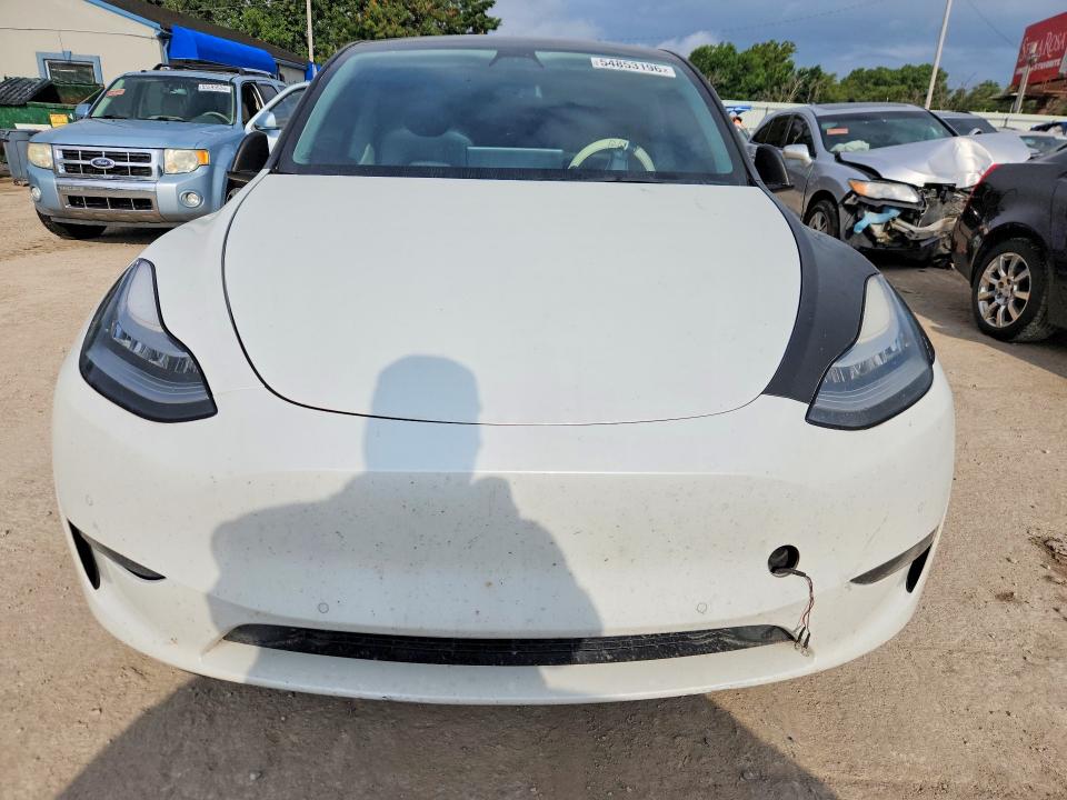 2021 Tesla Model y VIN 5YJYGDED5MF192833 COPART salvage auction — HAIL, Fl - Cert Of Title Slvg Rebuildable, sold $4,950 on 2026-07-13 (photo 5)