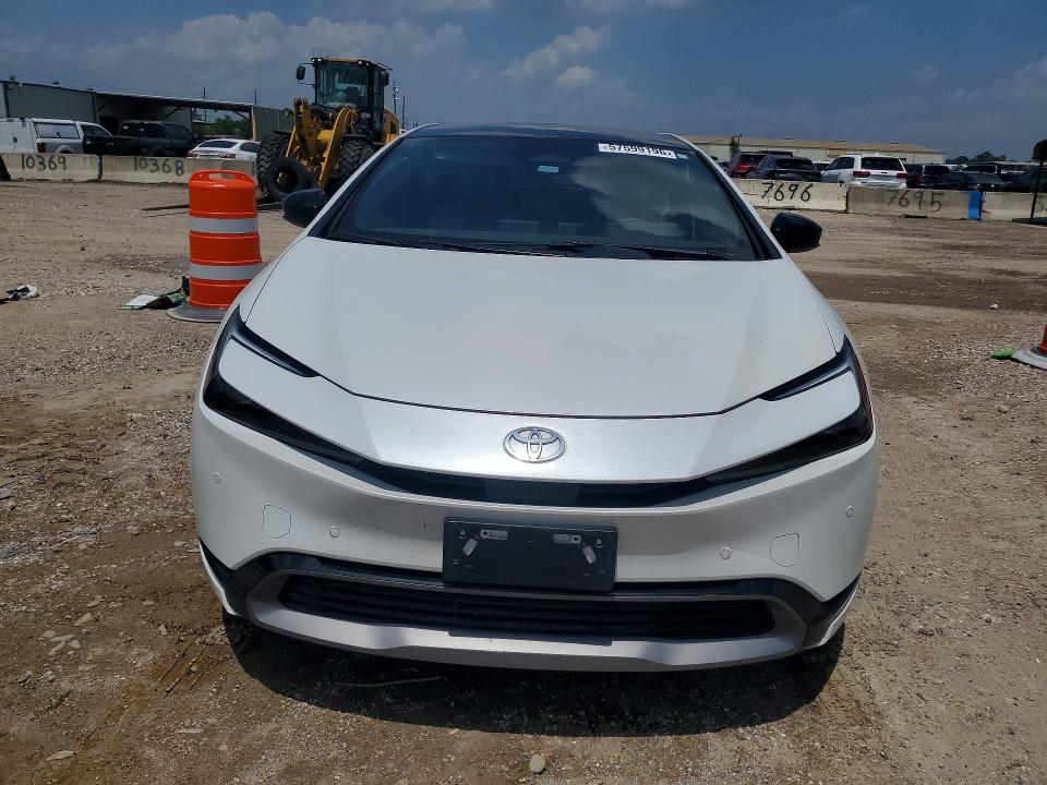 2023 Toyota Prius VIN JTDACAAU0P3011687 COPART salvage auction — SIDE, TX - SALVAGE VEHICLE TITLE (P), sold $7,000 on 2026-07-23 (photo 5)