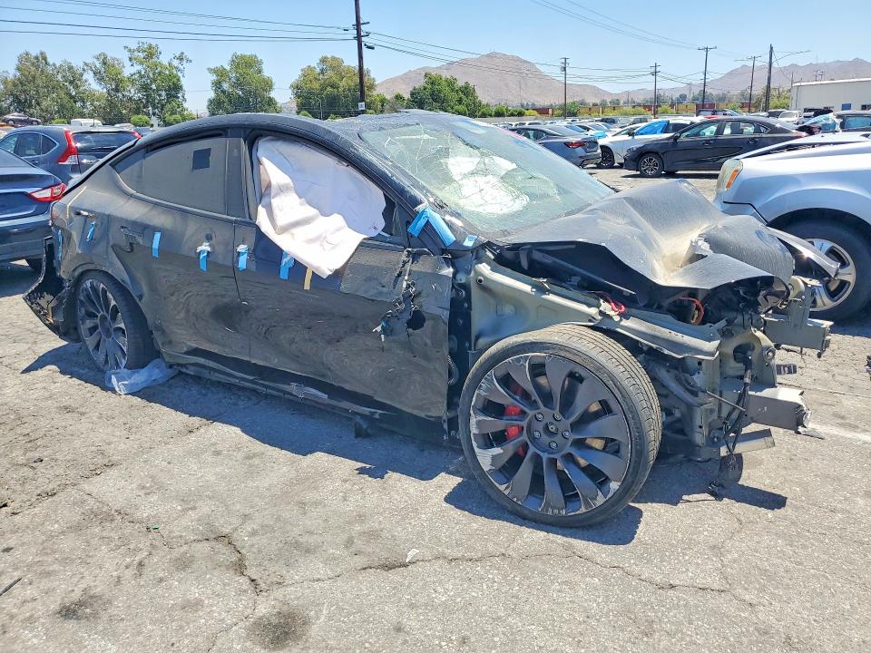 2023 Tesla Model y VIN 7SAYGDEF1PF859745 COPART salvage auction — ALL OVER, CA - SALVAGE CERTIFICATE, sold $1,650 on 2026-07-20 (photo 4)