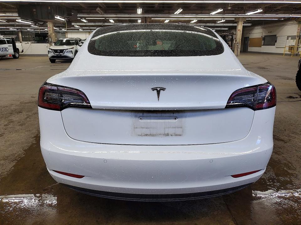 2022 Tesla Model 3 VIN 5YJ3E1EA8NF369445 COPART salvage auction — UNDERCARRIAGE, IL - SALVAGE CERTIFICATE, sold $6,000 on 2026-07-29 (photo 6)