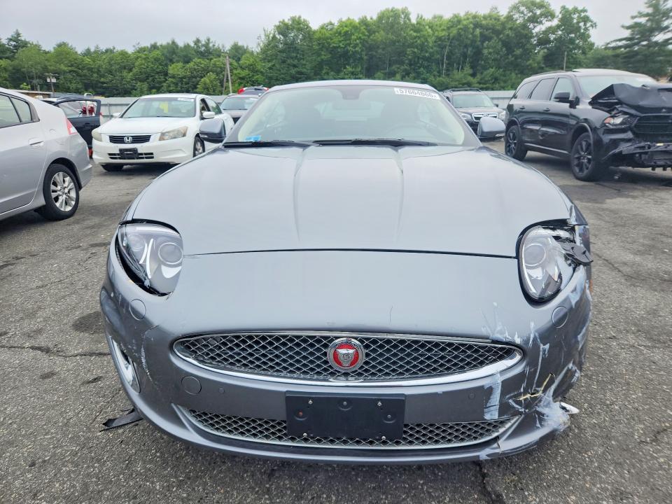 2014 Jaguar VIN SAJWA4FB6ELB54620 COPART salvage auction — FRONT END, Ri - Salvage Certificate Of Title, sold $10,900 on 2026-07-21 (photo 5)