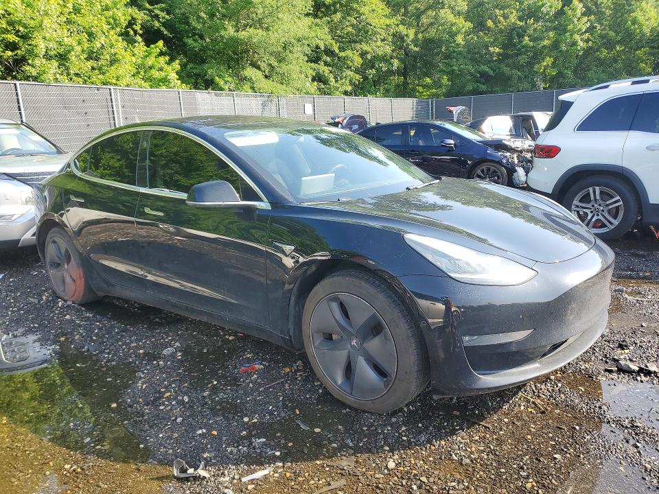 2018 Tesla Model 3 VIN 5YJ3E1EA8JF152035 COPART salvage auction — MINOR DENT/SCRATCHES, WV - CERTIFICATE OF TITLE, sold $8,600 on 2026-07-07 (photo 4)