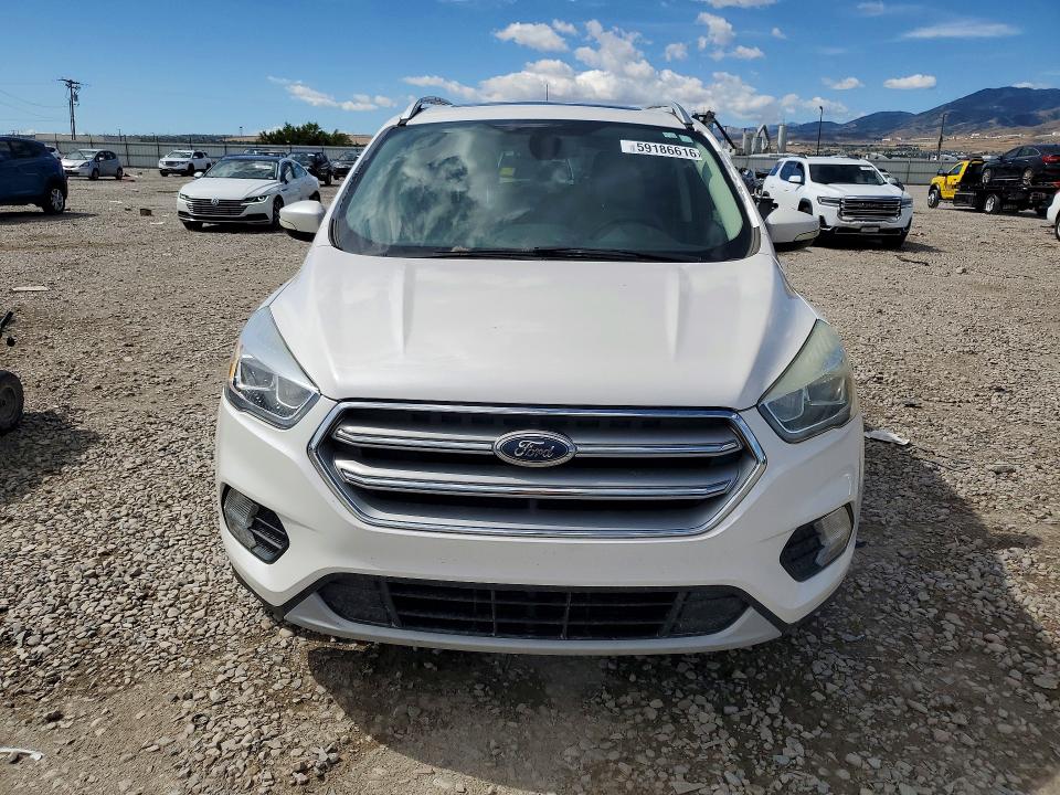 2017 Ford Escape VIN 1FMCU9J97HUE04173 COPART salvage auction — MINOR DENT/SCRATCHES, Ut - Cert Of Title-Rebuilt/Restored, sold $425 on 2026-07-04 (photo 5)