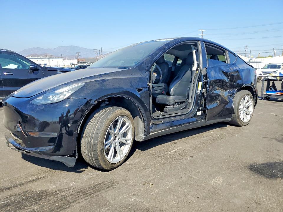 2023 Tesla VIN 7SAYGDEE4PA156824 COPART salvage auction — SIDE, Ca - Salvage Certificate, sold $7,700 on 2026-07-27 (photo 1)