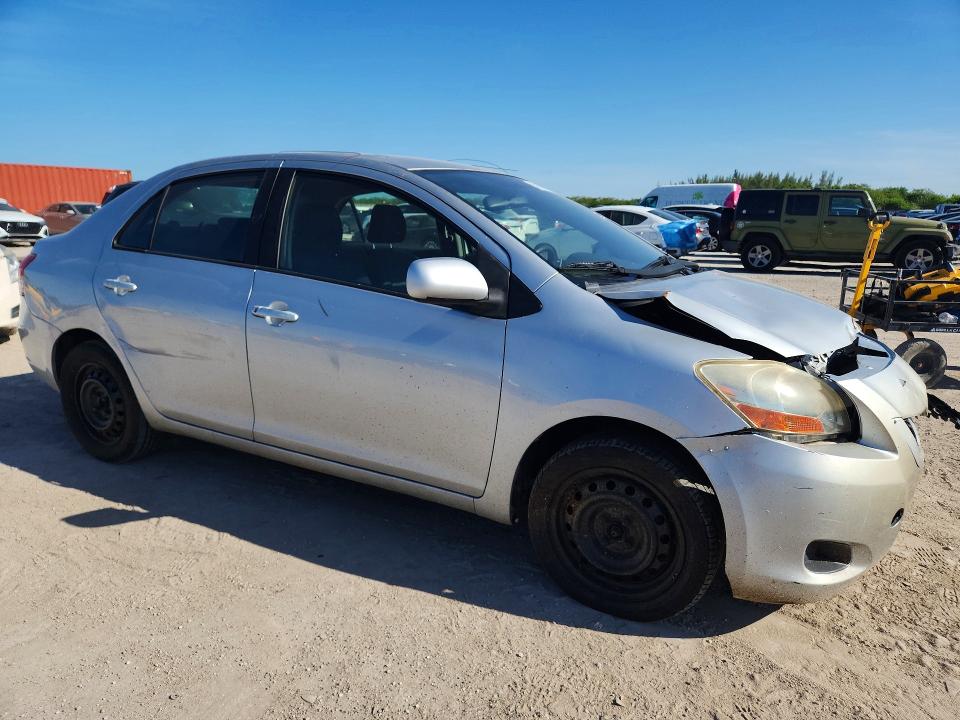 2011 Toyota Yaris VIN JTDBT4K37B1405476 COPART salvage auction — REAR END, Fl - Certificate Of Title, sold $1,500 on 2026-07-08 (photo 4)