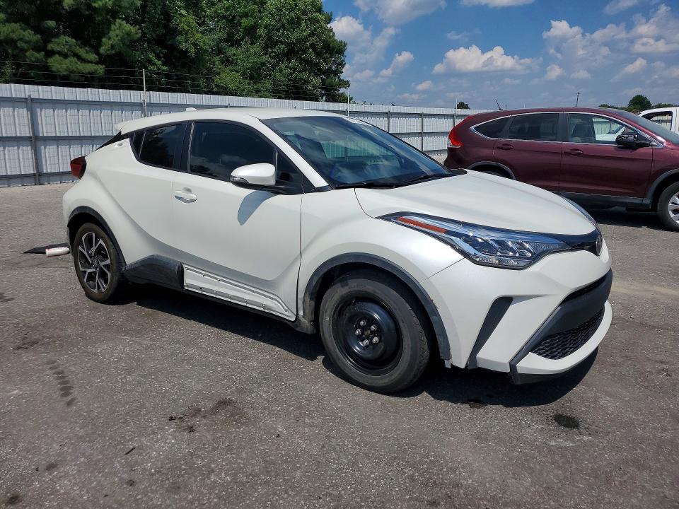 2020 Toyota C-hr VIN JTNKHMBX4L1090024 COPART salvage auction — SIDE, Nc - Salvage Certificate Of Title, sold $3,050 on 2026-07-30 (photo 4)