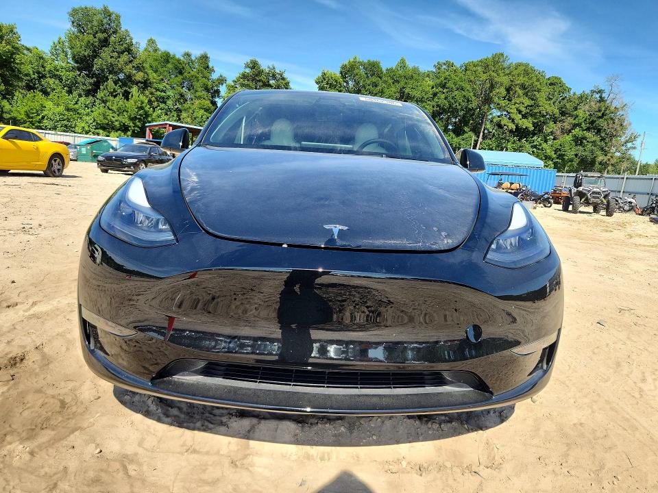 2024 Tesla Model y VIN 7SAYGDEF8RF039777 COPART salvage auction — SIDE, FL - CERT OF TITLE SLVG REBUILDABLE, sold $12,100 on 2026-07-24 (photo 5)