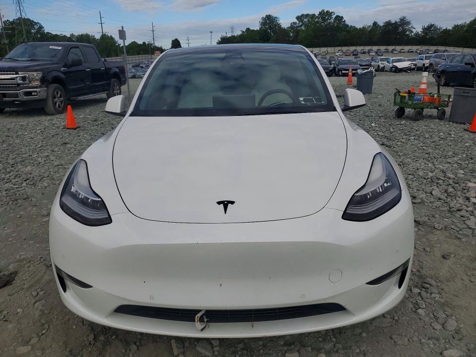 2021 Tesla Model y VIN 5YJYGAEE1MF195414 COPART salvage auction — SIDE, Nc - Salvage Certificate Of Title, sold $5,100 on 2026-07-22 (photo 5)